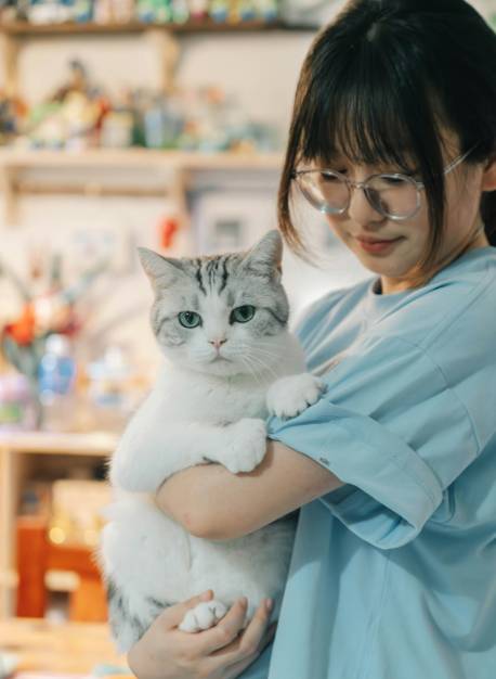 Veterinarian Hold Cat