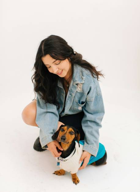 woman-holding-small-dog